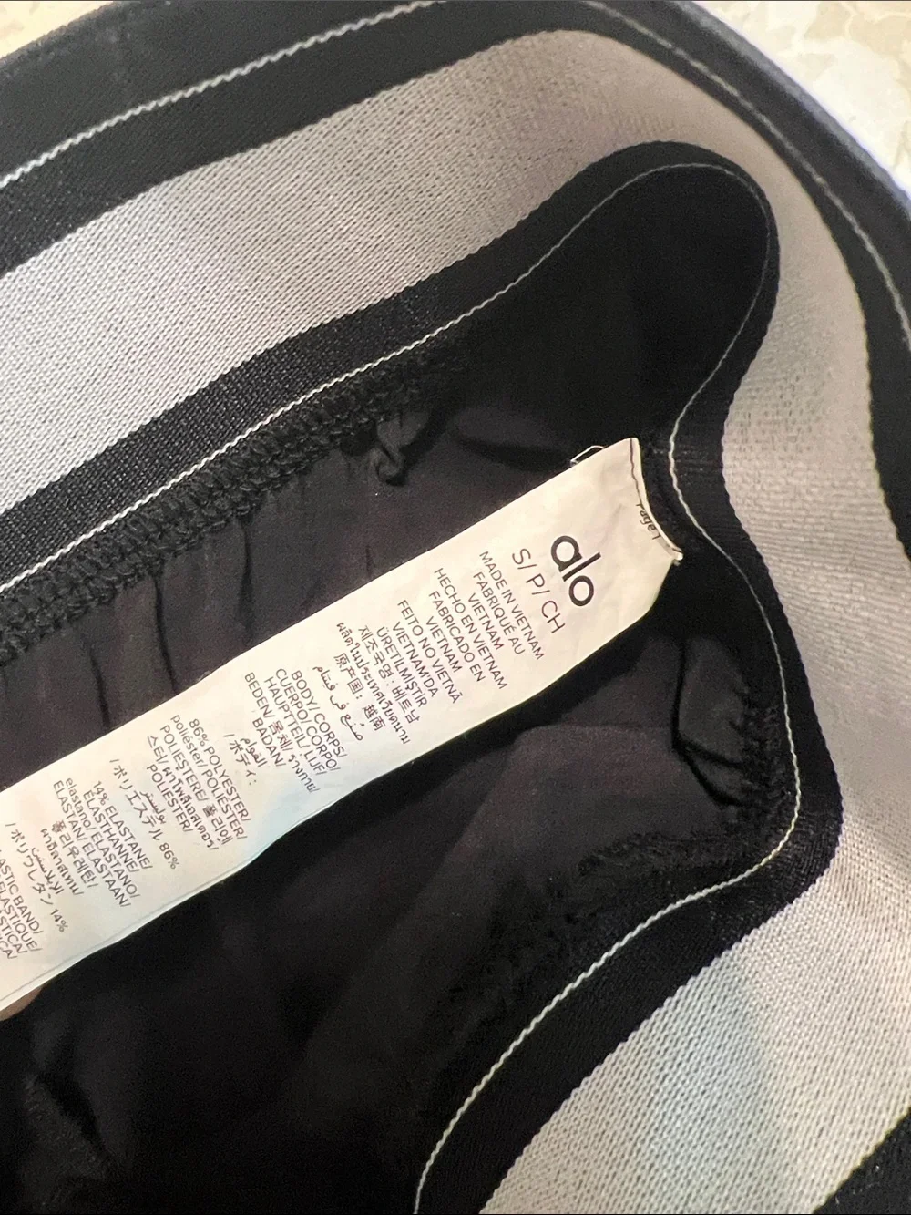ALO Yoga tags worn